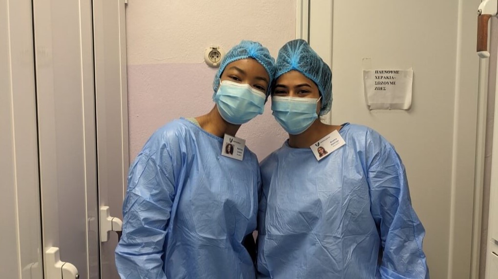 Our students in their blue scrubs